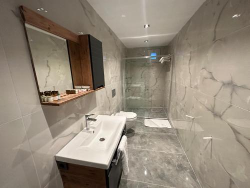 Et badeværelse på B&C Luxury Residence