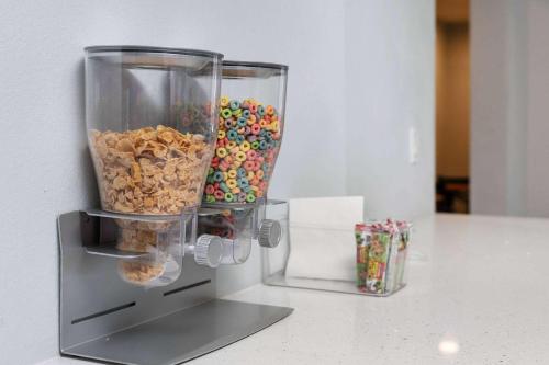 a food processor filled with cereal and candy at Days-Inn by Wyndham Albuquerque I-25 in Albuquerque