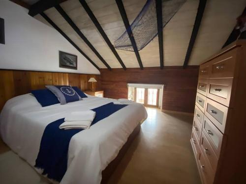 Postel nebo postele na pokoji v ubytování Loft in Getxo