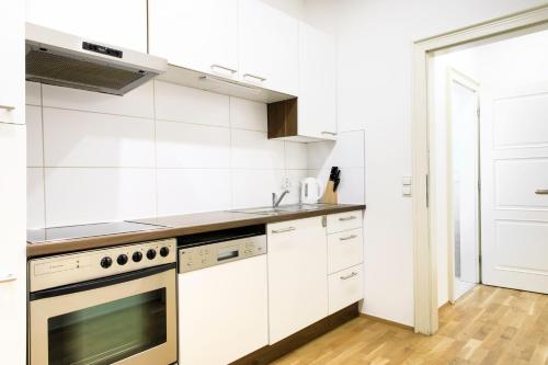 Cucina o angolo cottura di Lé David City Apartments 1020
