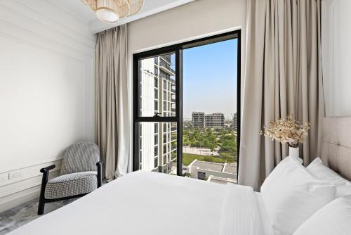 Postel nebo postele na pokoji v ubytování VayK - Beautifully Upgraded Two Bedroom in Dubai Hills