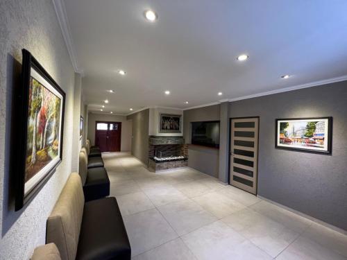 a living room with couches and a fireplace at Apartamentos Bella Vista in Bella Vista