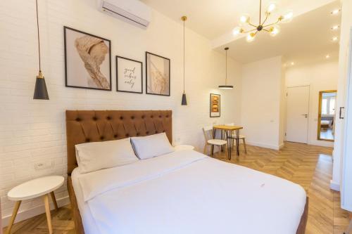 Ένα ή περισσότερα κρεβάτια σε δωμάτιο στο Self Check-in Apartments