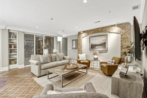 a living room with a couch and a table at 103 Seacrest in Hilton Head Island