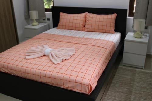 Postel nebo postele na pokoji v ubytování Belle Vue Lodge