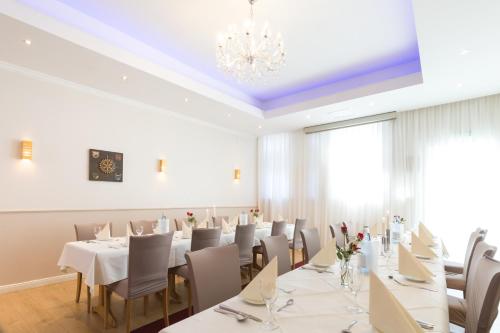 Un restaurante u otro lugar para comer en Hotel Wiggers