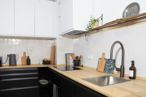 Kuchyň nebo kuchyňský kout v ubytování Servus O´gau Apartments