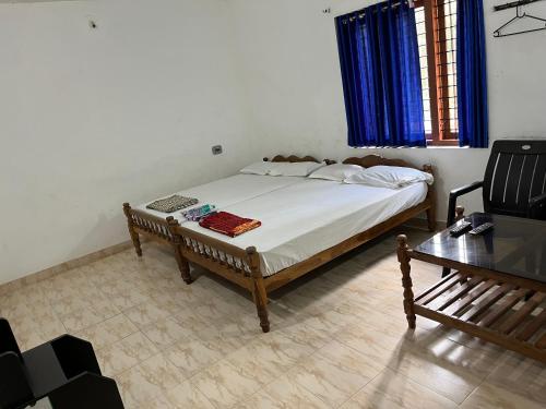 Cama o camas de una habitación en Dakshinakasi Guest House