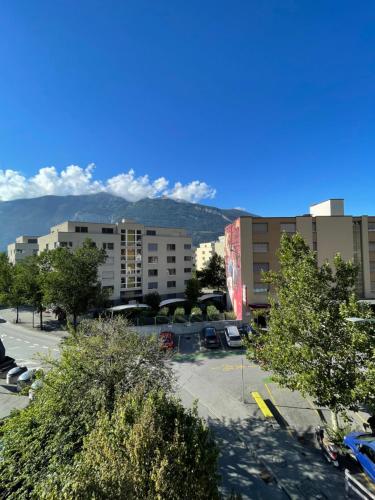 a view of a parking lot in a city at Haus zum Rütli in Chur