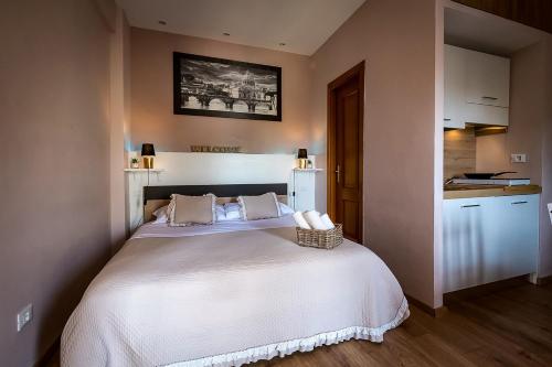 Ένα ή περισσότερα κρεβάτια σε δωμάτιο στο St Peter's Boutique Roma