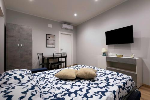 Cama o camas de una habitación en Il Rosone - Rooms&Apartments