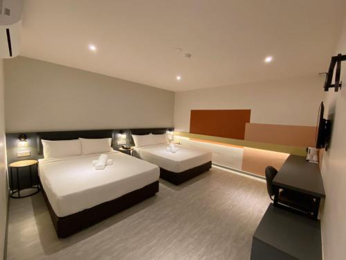 Woco Boutique Hotel Kinraraにあるベッド