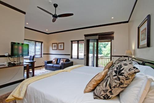 Postel nebo postele na pokoji v ubytování No 66 Sandton Lodge