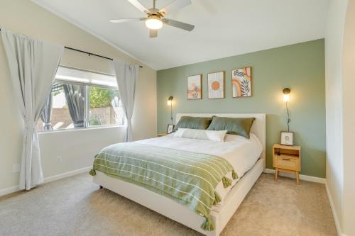 a bedroom with a bed and a window at Stunning Phoenix Vacation Rental with Private Pool! in Phoenix