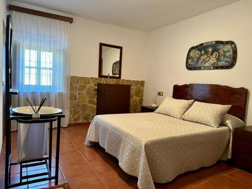 Postel nebo postele na pokoji v ubytování Casa El Chorreador