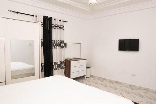 Una cama o camas en una habitación de Ej guest house