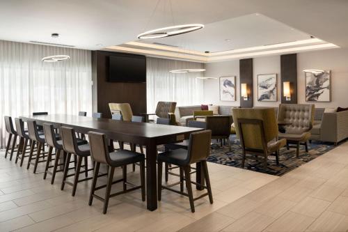a conference room with a table and chairs at Residence Inn by Marriott Oakland Downtown in Oakland