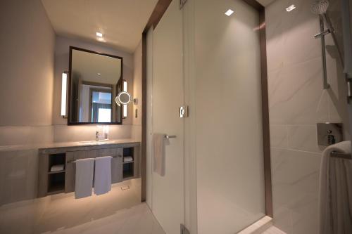 Koupelna v ubytování Modern Serviced Apartment - Pool & Gym Access
