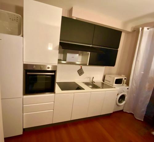 Kuchyň nebo kuchyňský kout v ubytování B&B L'Orizzonte