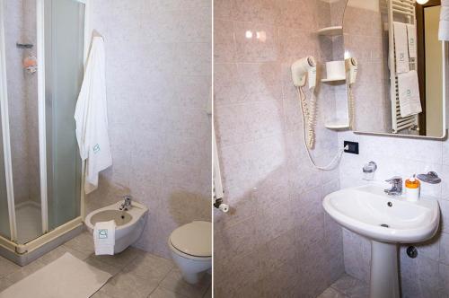uma casa de banho com um lavatório, um WC e um chuveiro em ALLOGGI VITALE em Cesano Maderno