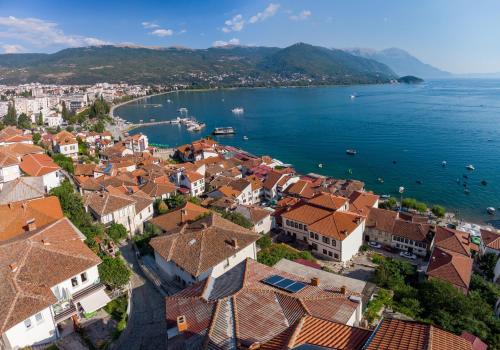 an aerial view of a town next to the water at Villa Malezan in Ohrid