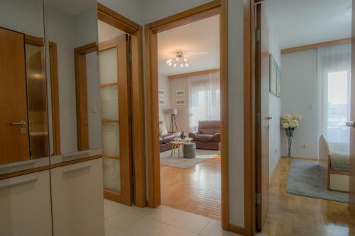 a view of a living room from the hallway at City Nest apartment in Podgorica