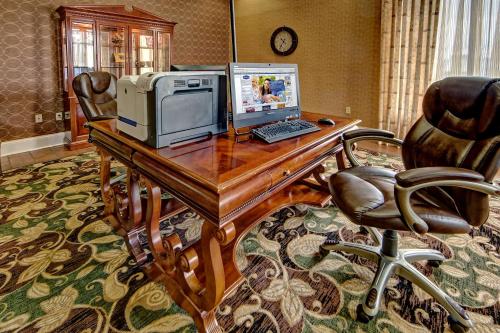 a desk with a computer on top of it at Hampton Inn Morristown in Morristown