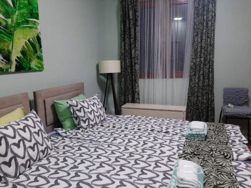 Cama ou camas em um quarto em Apartman Ana