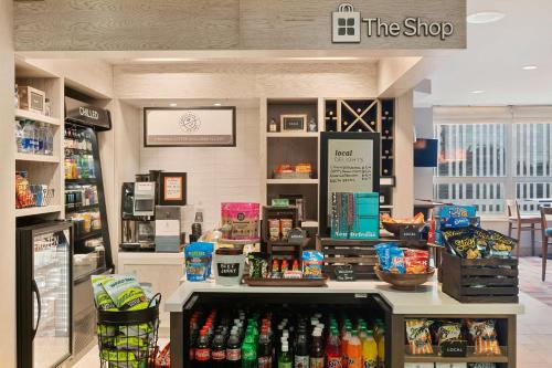 a store with a counter with drinks on it at Hilton Garden Inn New Orleans French Quarter/CBD in New Orleans