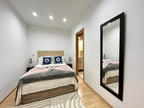 Letto o letti in una camera di Centro Embajadores Ave