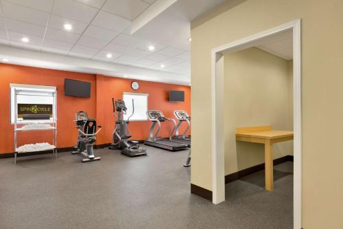 a gym with cardio equipment in a building at Home2 Suites By Hilton Macon I-75 North in Macon