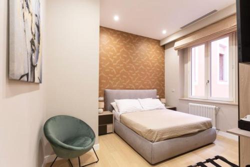 Кровать или кровати в номере Casa Ilaria