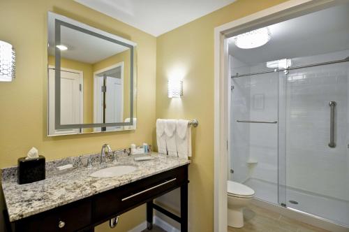 a bathroom with a sink and a toilet and a shower at Homewood Suites By Hilton Augusta Gordon Highway in Augusta