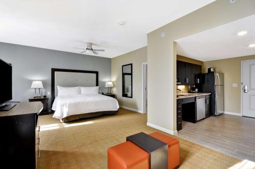 a large bedroom with a bed and a kitchen at Homewood Suites By Hilton Augusta Gordon Highway in Augusta