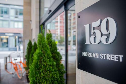 a sign for a morgan street sign in front of a store at Canopy By Hilton Jersey City Arts District in Jersey City