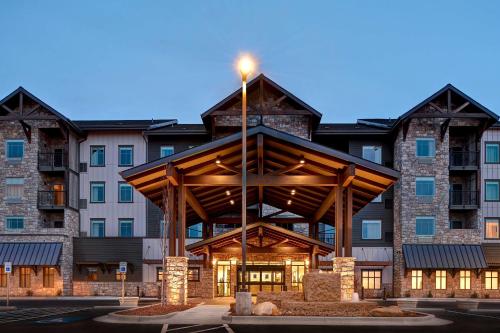 a large building with a light on top of it at Homewood Suites By Hilton Eagle Boise, Id in Eagle