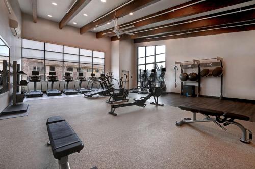 a gym with several treadmills and machines in a room at Homewood Suites By Hilton Eagle Boise, Id in Eagle