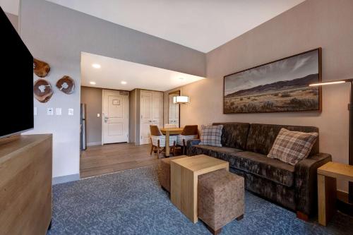 a living room with a couch and a table at Homewood Suites By Hilton Eagle Boise, Id in Eagle