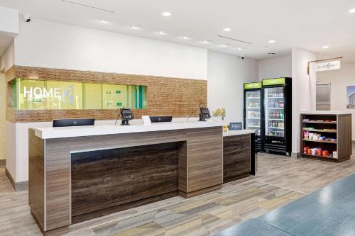 a store lobby with a counter in a store at Home2 Suites By Hilton Johnson City, Tn in Johnson City