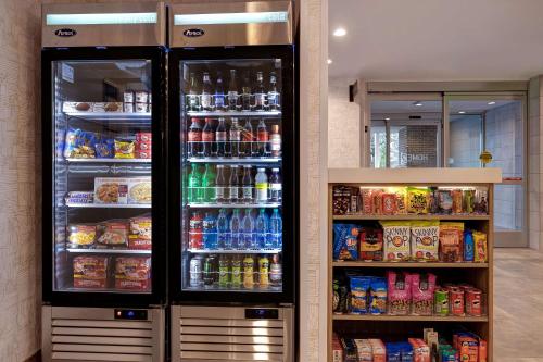 a refrigerator filled with lots of drinks and food at Home2 Suites By Hilton Blythewood, Sc in Blythewood