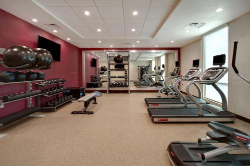 a gym with treadmills and exercise equipment in a room at Home2 Suites By Hilton Burleson in Burleson