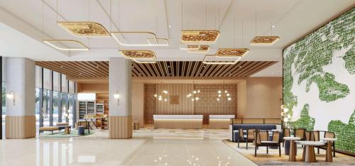 eine Lobby mit Warteraum in der Unterkunft Hilton Garden Inn Chenzhou Beihu in Chenzhou