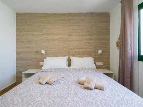 Posteľ alebo postele v izbe v ubytovaní Seascape Pool View & WiFi by iRent Fuerteventura Corralejo