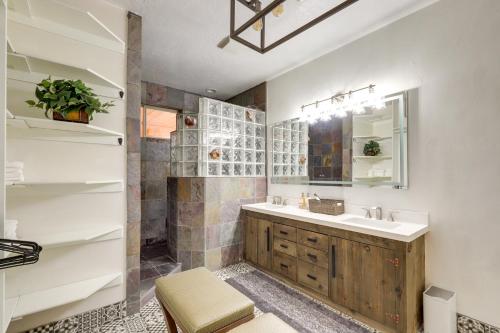 een badkamer met een wastafel en een spiegel bij Heber City Home Private Yard and Hot Tub! in Heber City