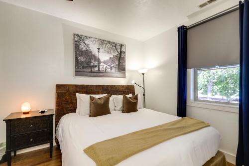 een slaapkamer met een groot wit bed en een raam bij Heber City Home Private Yard and Hot Tub! in Heber City
