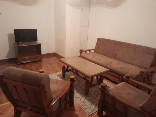 TV a/nebo společenská místnost v ubytování Apartmani Drmanic