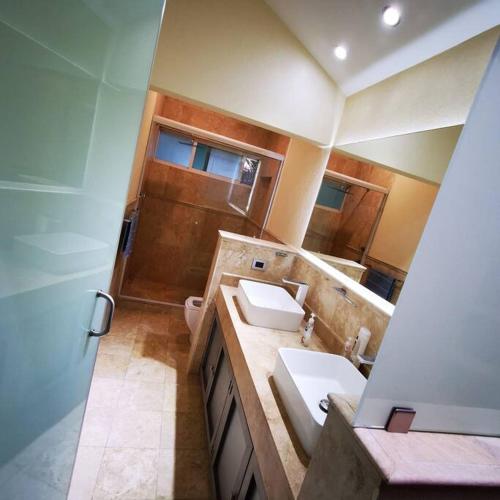Ванная комната в Villa Completa Grupos Alberca Asador Eventos