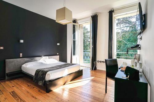Ένα ή περισσότερα κρεβάτια σε δωμάτιο στο Hôtel Château La Chèze - Bordeaux Floirac