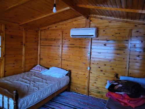 Кровать или кровати в номере Starlight Camp Nuweiba