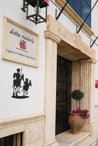 a sign on the side of a building at Doña Ruidera in Ruidera